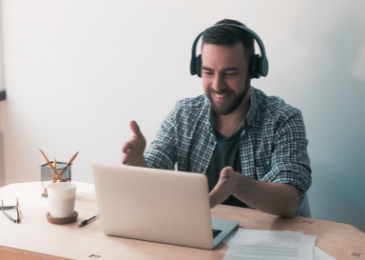 remote worker assisting on a call with headphones